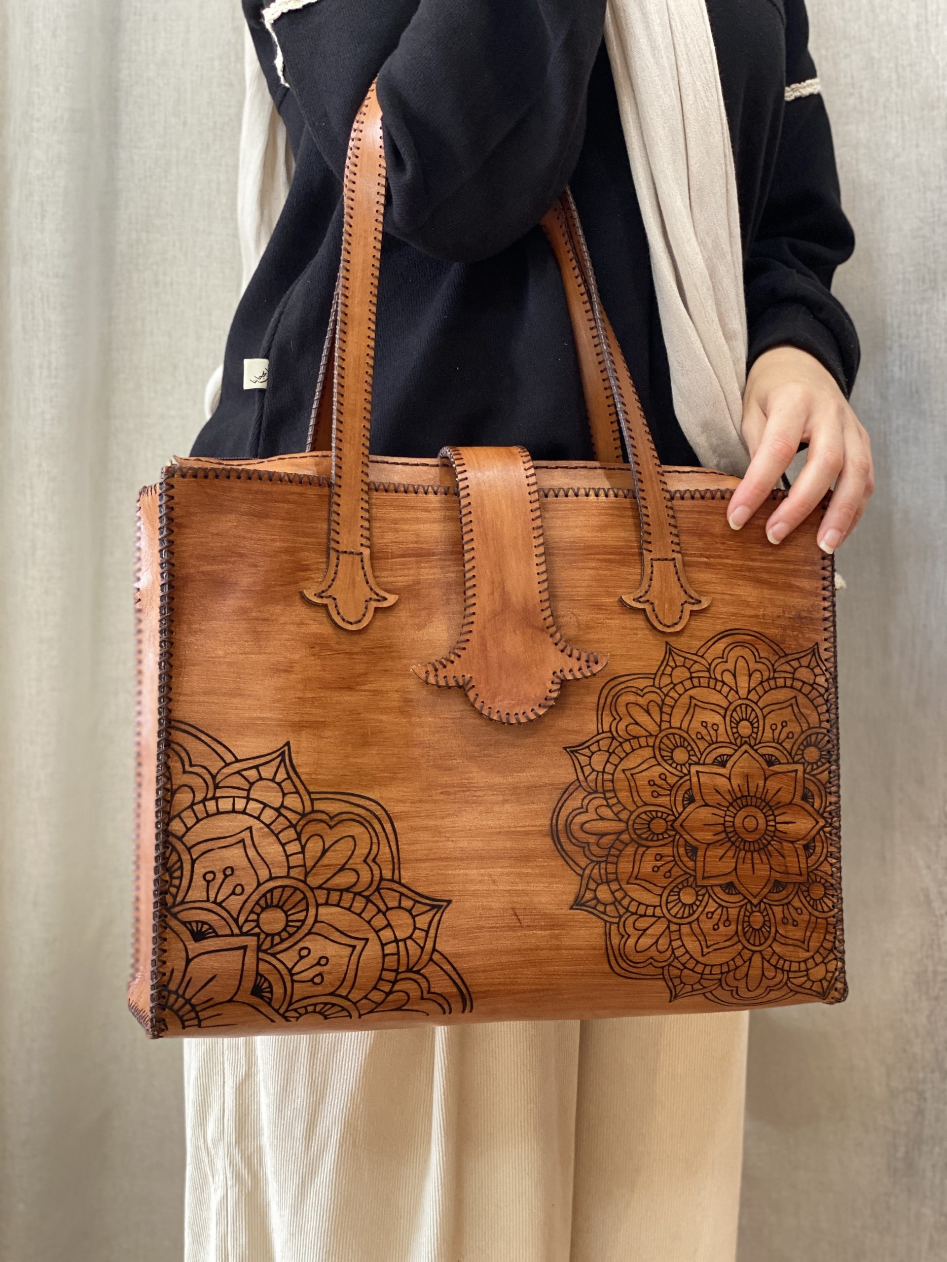 شنطة كنوز الجلد